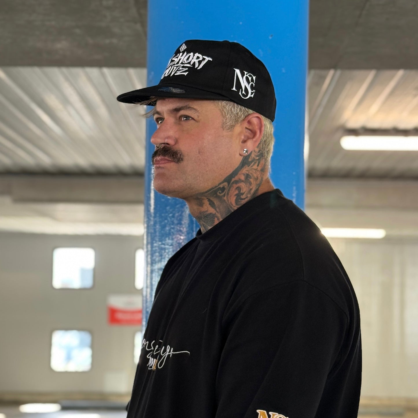 The “BRAND” cap