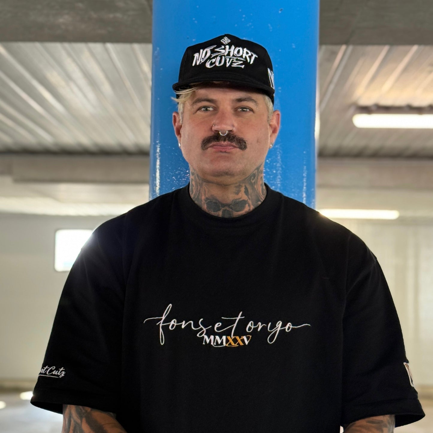 The “BRAND” cap
